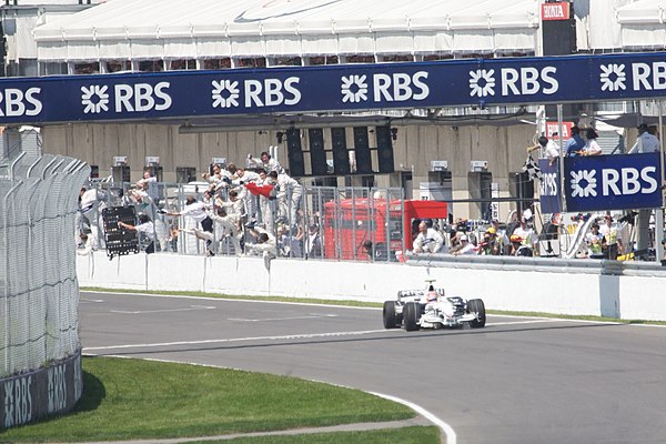 Robert Kubica crosses the finish line to win the 2008 Canadian Grand Prix, the only Formula One race that BMW has won as a full works team.