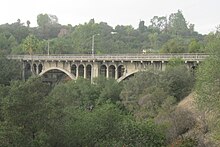 La Loma Bridge, built in 1914, spans the Arroyo Seco. La Loma Bridge from side (cropped).JPG