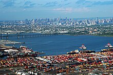 Port Newark is seen in the foreground looking northeast across the Newark Bay