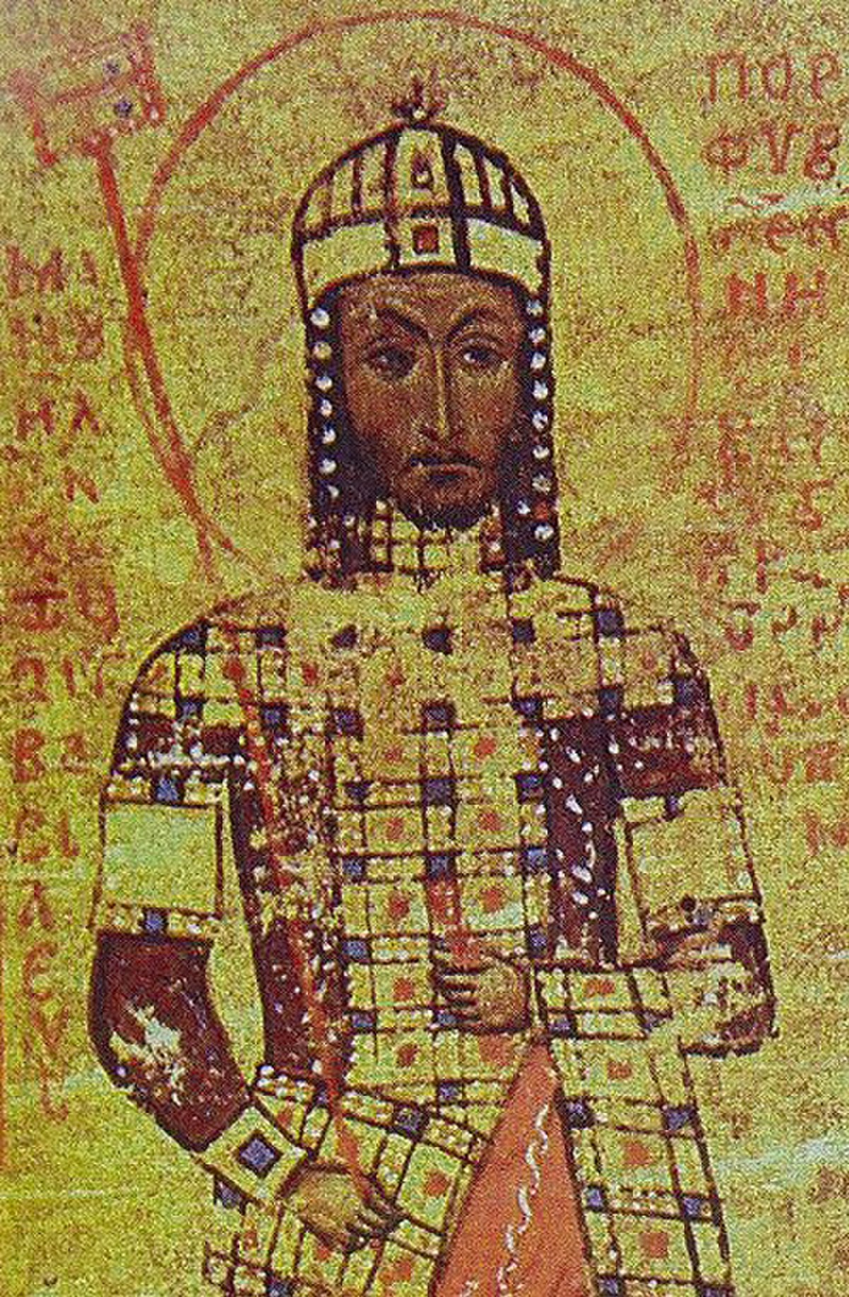 A bearded man wearing a crown