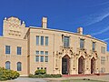 The Wichita Falls City Hall occupies the bottom floor of the Memorial Auditorium, 1927; a municipal annex building is located to the right of the auditorium