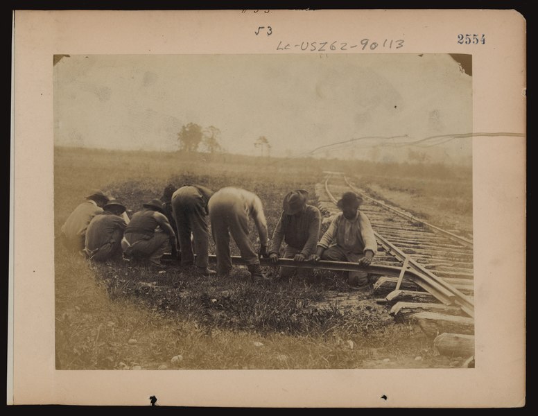 File:Military railroad operations in northern Virginia- African American laborers twisting rail LCCN97502056.tif