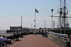 Minerva Pier, with a Union Flag flying high, in Kingston upon Hull.