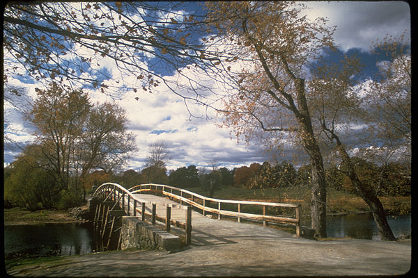 The extant 1956 bridge, an approximate replica of the 1760 bridge present during the Battles of Lexington and Concord