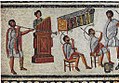 Image 4Musicians playing a Roman tuba, a water organ (hydraulis), and a pair of cornua, detail from the Zliten mosaic, 2nd century AD (from Culture of ancient Rome)