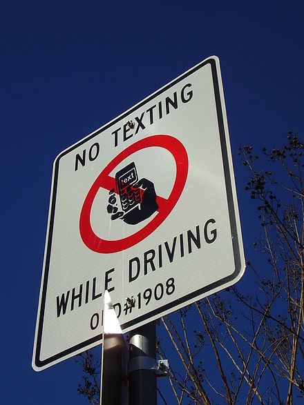 A sign in West University Place, Texas (Greater Houston), advising drivers that they are not allowed to text