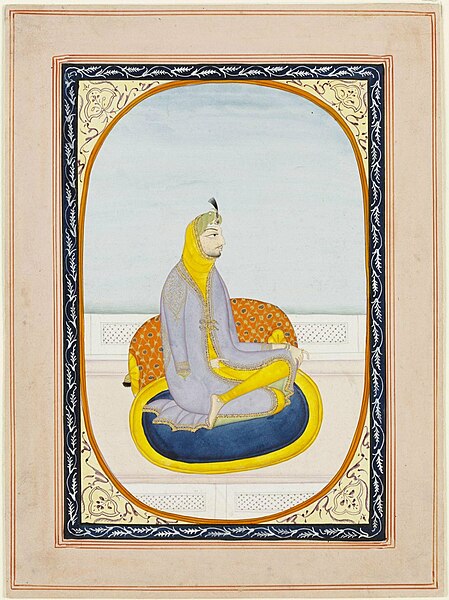 File:Painting of Nau Nihal Singh seated on a blue oval rug against a bolster with a yellow shawl reaching up to the back of his head, ca.1840.jpg