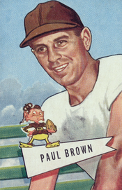 Paul Brown (shown here as head coach of the Cleveland Browns) led the Buckeyes to their first national championship in 1942. Paul Brown, American football head coach.png