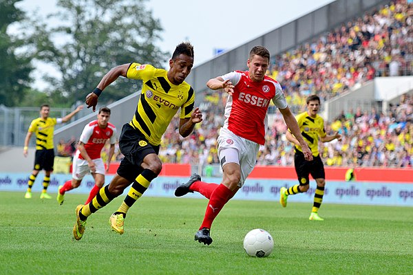 Aubameyang (left) playing for Borussia Dortmund in 2014