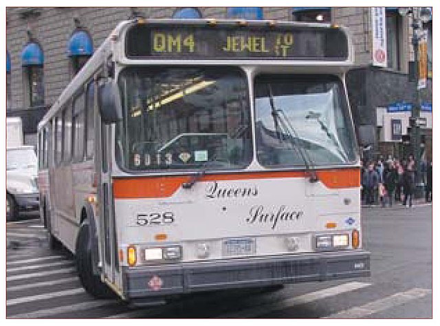 Queens Surface QM4 bus in Midtown Manhattan. This bus is now retired and scrapped.