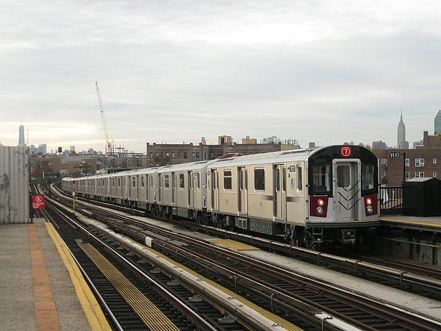 Manhattan-bound 7 local train of R188s leaving 52nd Street