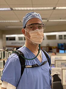 Doctor with mask and camelback