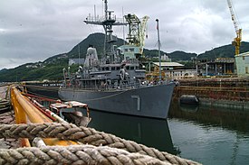 USS Patriot (MCM-7) in a wet berth at Ship's Repair Facility in Sasebo, Japan, taking measures to avoid damage from the incoming Typhoon Shanshan Shanshan ships preparations Sasebo 2006.jpg