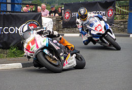 Dunlop leading Guy Martin at the 2012 Isle of Man Southern 100 road races Southern 100 Races 2012 IMG 00071.jpg