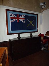 Army Ensign of HMAV Arakan laid up in St John's Church, Marchwood. St John the Apostle, Marchwood- flag above the church chest (geograph 1946813).jpg