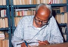 Sastry in his personal library. T. V. Venkatachala Sastry in his study.jpg