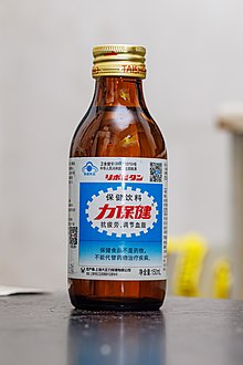 A standard 100ml brown bottle of Lipovitan labled with Chinese characters