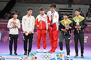 Deutsch: Tischtennis bei den Olympischen Jugendspielen 2018; Tag 9, 15. Oktober 2018; Mixed Medaillenzeremonie - Gold: Yingsha Sun & Wang Chuqin (CHN), Silber: Miu Hirano & Tomokazu Harimoto (JPN), Bronze: Su Pei-ling & Lin Yun-ju (TPE)); Medaillen-Verleiher: IOC member Ryu Seung-minu (KOR), Maskottchen-Verleiher: ITTF Vice-Presiden Nestor Tenca (ARG) English: Table tennis at the 2018 Summer Youth Olympics at 15 October 2018 – Mixed Medal Ceremony - Gold: Yingsha Sun & Wang Chuqin (CHN), Silver: Miu Hirano & Tomokazu Harimoto (JPN), Bronze: Su Pei-ling & Lin Yun-ju (TPE)); Medal presenter: IOC member Ryu Seung-minu (KOR), Mascot presenter: ITTF Vice-Presiden Nestor Tenca (ARG)