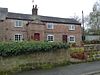 The East and West Cottages attached to the Village Hall, Great Barrow.jpg