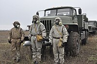 Підрозділ військ РХБЗ в захисних костюмах на полігоні «Леб'яже»