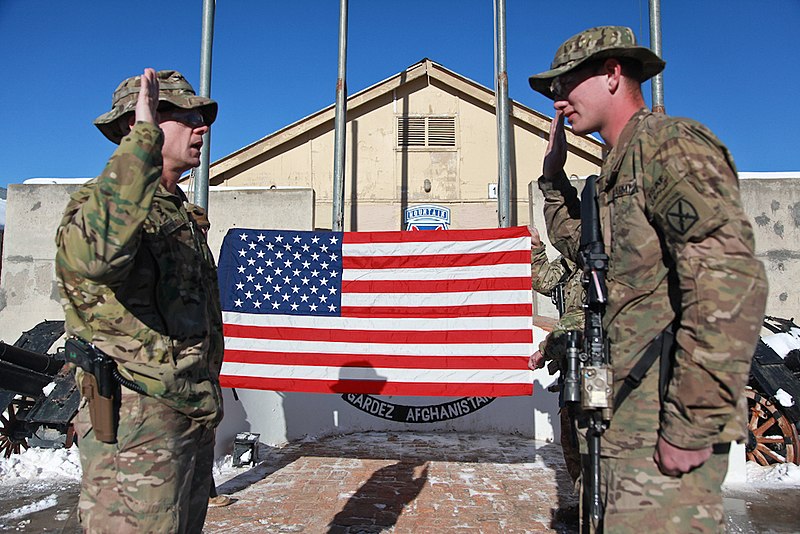 File:U.S. Army Col. Sam Whitehurst, left, the commander of the 3rd Brigade Combat Team, 10th Mountain Division, administers the oath of enlistment to Sgt. Robert Ford during a re-enlistment ceremony at Forward 140102-A-RU942-022.jpg