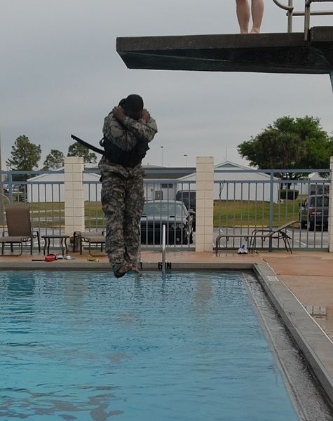 File:U.S. Army Spc. Daren Thompson, a health care specialist assigned to the 7226th Medical Support Unit, approaches the water after jumping off a high-dive platform during the combat water survival event of the Army 130323-A-HZ691-947.jpg