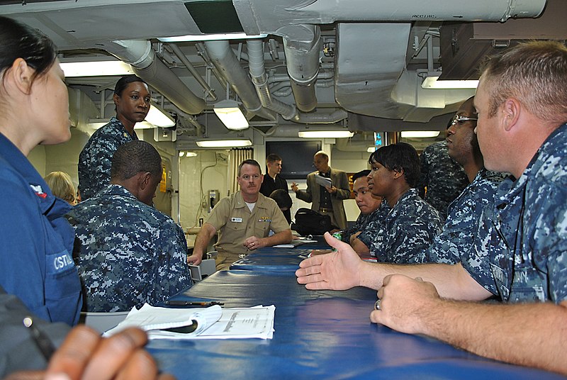 File:US Navy 100413-N-8374E-348 Capt. Hank R. Reeves, sitting center, project director for the Sea Warrior Program Integrated Learning Environment, l.jpg