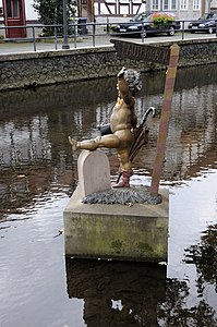 sculpture with lost stocking and an old story (de:Lauterbacher Strumpflied)