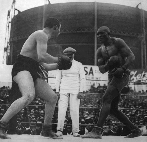 Jack Johnson (right) fighting Tommy Burns for the World Heavyweight Championship in 1908