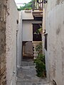 * Nomination: Alley in Kastro of Chora of Naxos. --C messier 20:46, 22 October 2023 (UTC) * Review  Comment Purple CAs on electric cables. The sky is a bit burnt (blown-out), and the pictures is quite noisy. --Sebring12Hrs 11:15, 29 October 2023 (UTC)