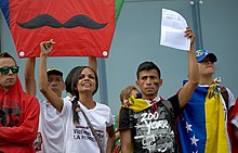 Marvinia Jimenez and others protesting during a march from Altamira Square to the UNDP headquarters. 7 December 2014 Venezuela protest.jpg