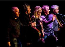 Altan on their North America Tour in 2010. L-R: Ciarán Curran, Ciarán Tourish, Mairéad Ní Mhaonaigh, Dermot Byrne and Dáithí Sproule.