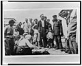 Armenian refugees on Black Sea beach, gathered around seated person, Novorossiĭsk, Russia LCCN2002695434.jpg