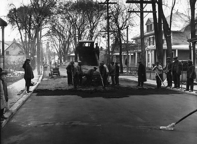 Workers spreading asphalt in Sault-au-Récollet about 1930.