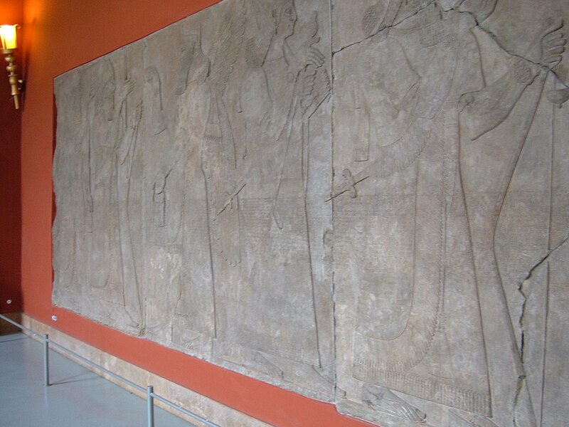 File:Assyrian wall relief Nimrud PM.JPG