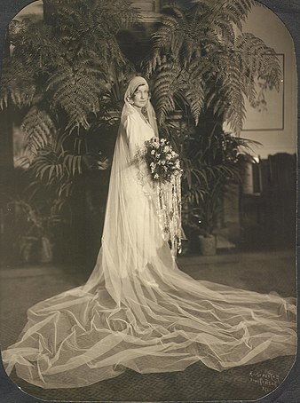 A bride in an elaborate wedding dress, USA 1929.