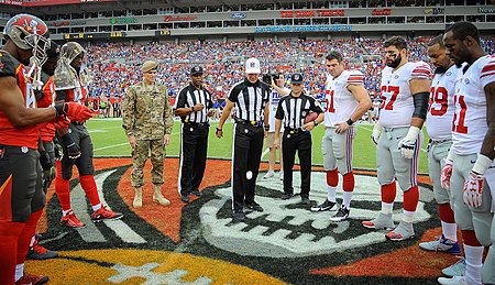 Pugh at the coin flip before the start of a game against the Tampa Bay Buccaneers in 2015.