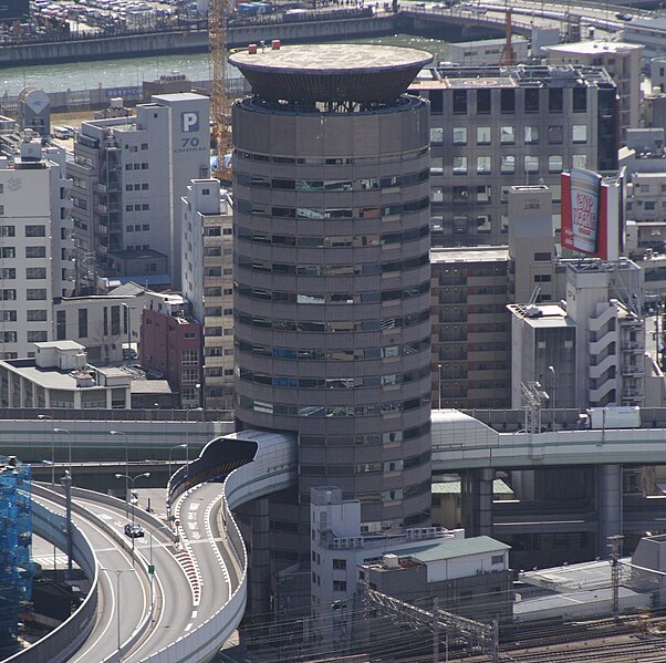 File:Building penetrated by an expressway 001 OSAKA JPN (square crop).jpg