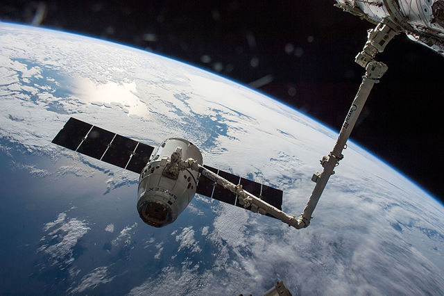 The CRS-8 SpaceX Dragon captured by Canadarm on April 10, 2016