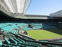 Centre Court at Wimbledon. First played in 1877, the Championships is the oldest tennis tournament in the world.[171]
