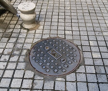 circle manhole cover at Macau