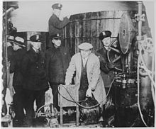 Detroit police enforcing the prohibition on alcohol Detroit police inspecting equipment found in a clandestine underground brewery during the prohibition era - NARA - 541928.jpg