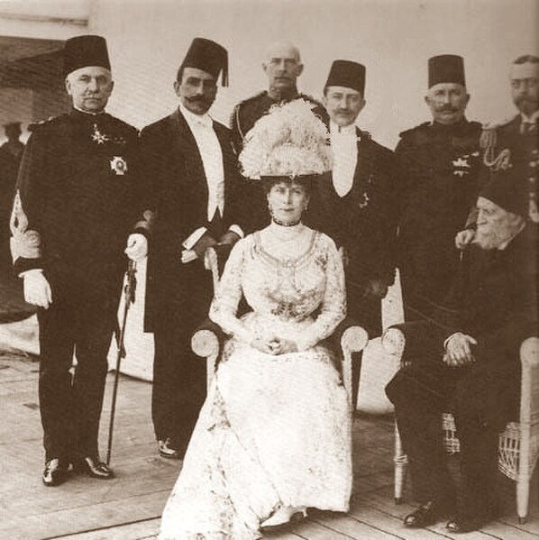 Gathering of Egyptian, Turkish, and British royalty in 1911. Queen Mary seated and King George V standing at extreme right