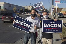 Bacon (right) campaigning with then-Senator Ben Sasse on Election Day 2020 Election Day in Omaha IMG 8543 (50564671487).jpg