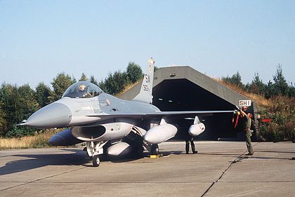 A US Air Force F-16 Fighting Falcon from the 363rd Tactical Fighter Wing at Rygge Air Station during Exercise Coronet Gauntlet '83. F-16 outside hangar at Rygge.JPEG