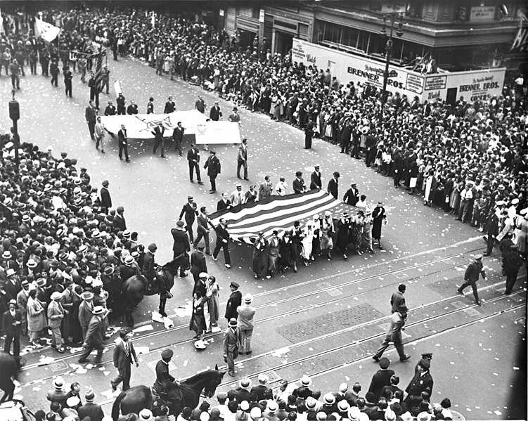 File:Female film industry workers carrying a large American flag as part of an National Recovery Administration parade, New York City (cropped & flipped).jpg