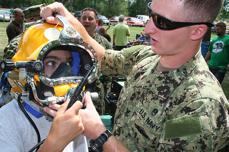 File:Flickr - Official U.S. Navy Imagery - A Navy diver demonstrates diving equipment to a young volunteer..jpg