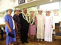 Anand Satyanand and Lady Satyanand wear lei while visiting the Cook Islands