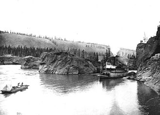 A steamer lining upstream through Five Finger Rapids, on the Yukon River, circa 1899 Guiding a steamboat using ropes through Five Finger Rapids on the Yukon River, Yukon Territory, ca 1899 (HEGG 390).jpeg