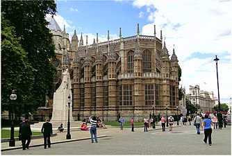 The statue of George V and the Henry VII Chapel of Westminster Abbey